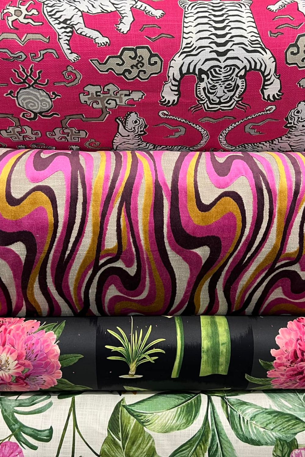 rolls of multicolored fabric