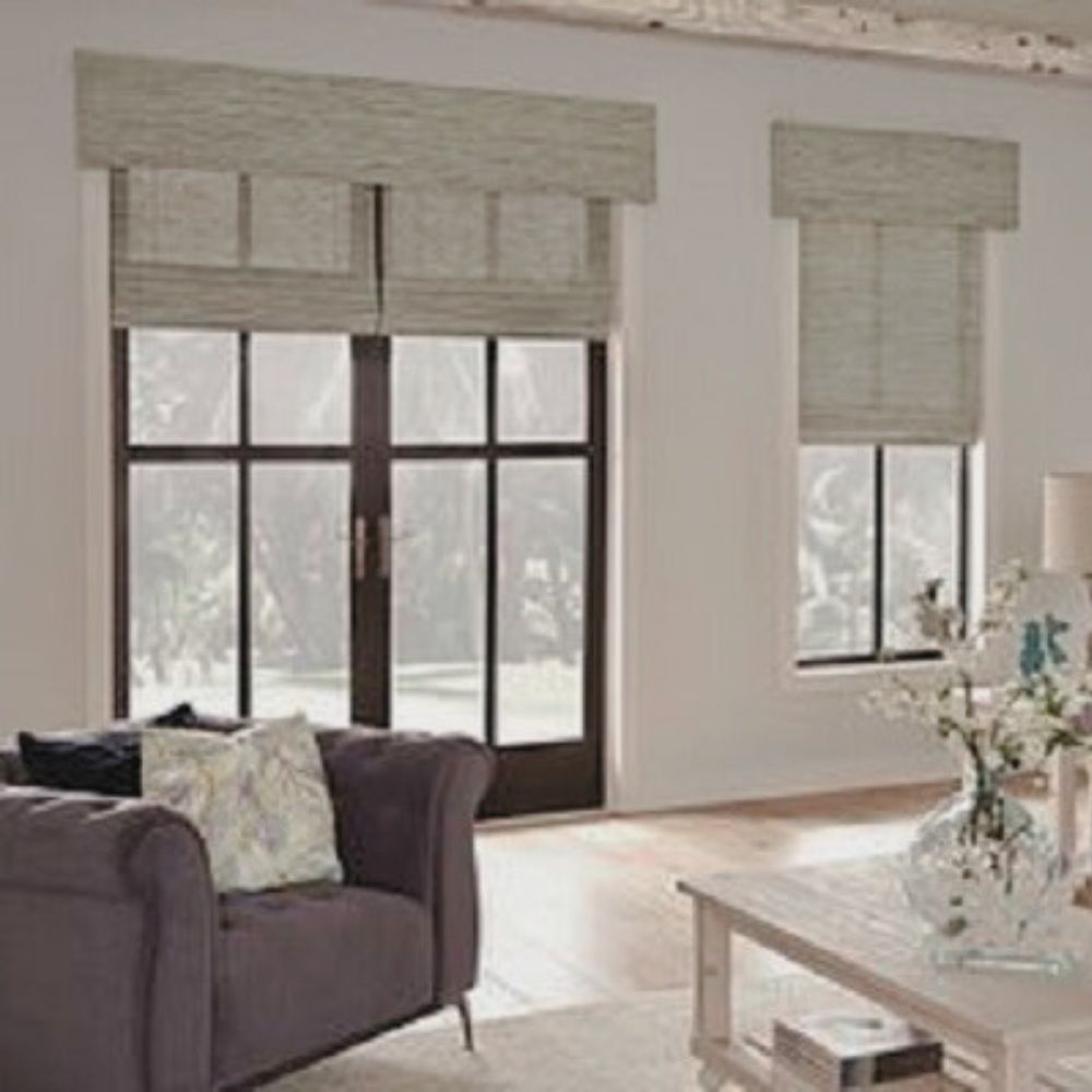 Roman shades on French doors in a living room.
